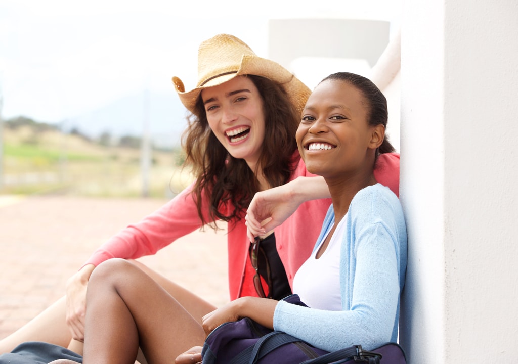 Two girls are laughing