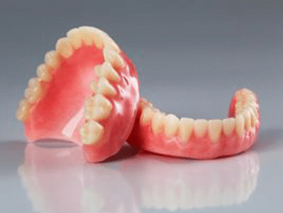 Dentures on the glossy table